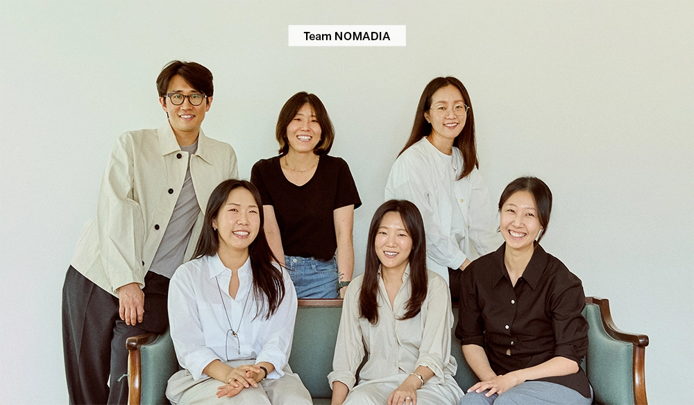 Group portrait of six NOMADIA team members
